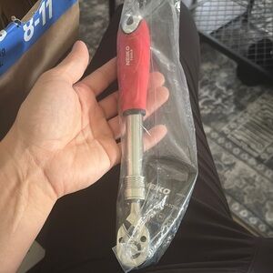 Red Adjustable Wrench